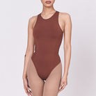 A woman wearing a teddy shapewear