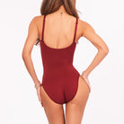 A woman wearing a cherry shapewear