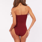 A woman wearing a cherry shapewear